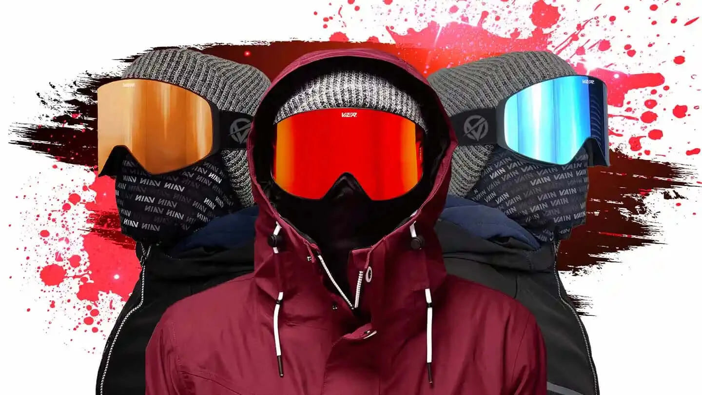 Three men wearing colored ski goggles