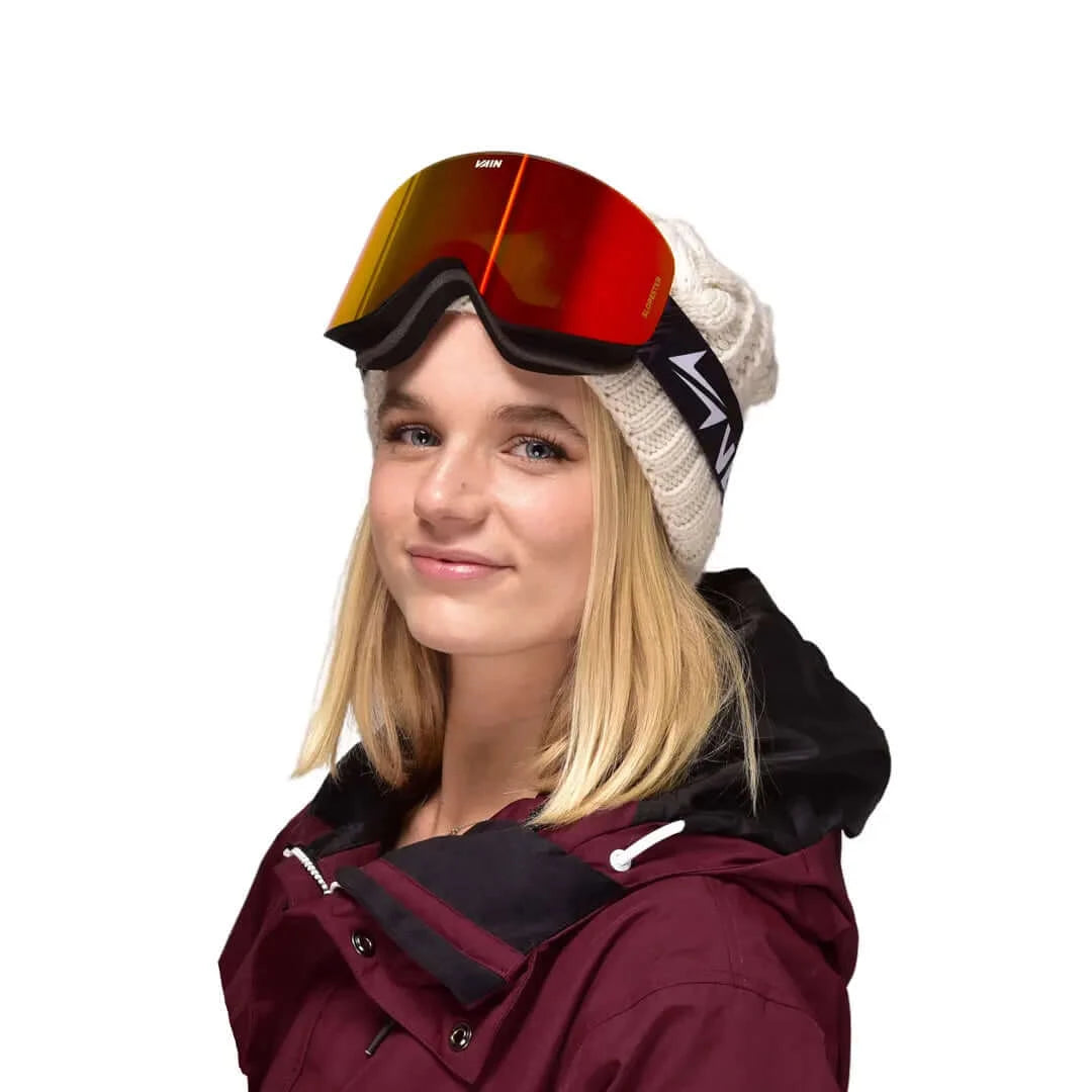 Girl with red Carver ski goggles on from VAIN